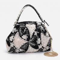 Borsa a mano Rasha in tessuto ricamato Anembags