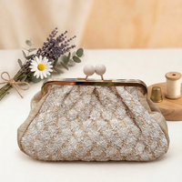 Borsa Clelia clucht con pomelli laccati Anembags