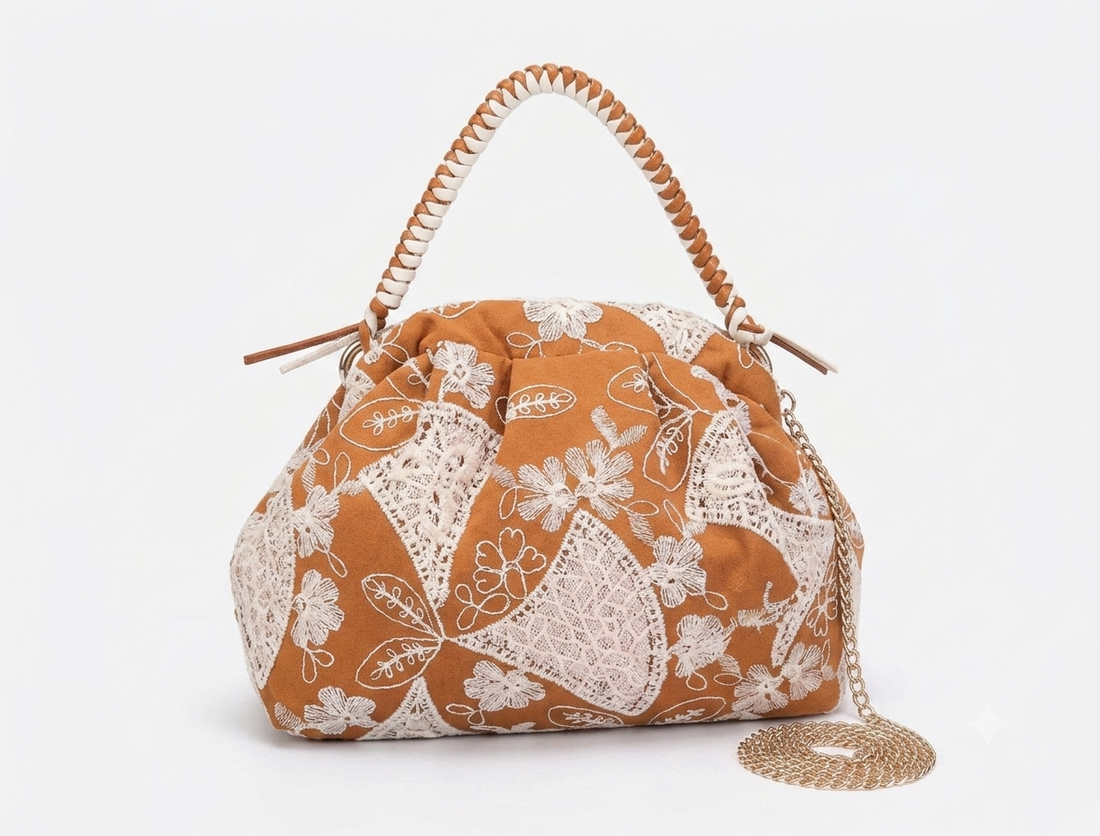Borsa a mano Rasha in tessuto ricamato Anembags