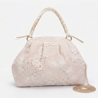 Borsa a mano Rasha in tessuto ricamato Anembags
